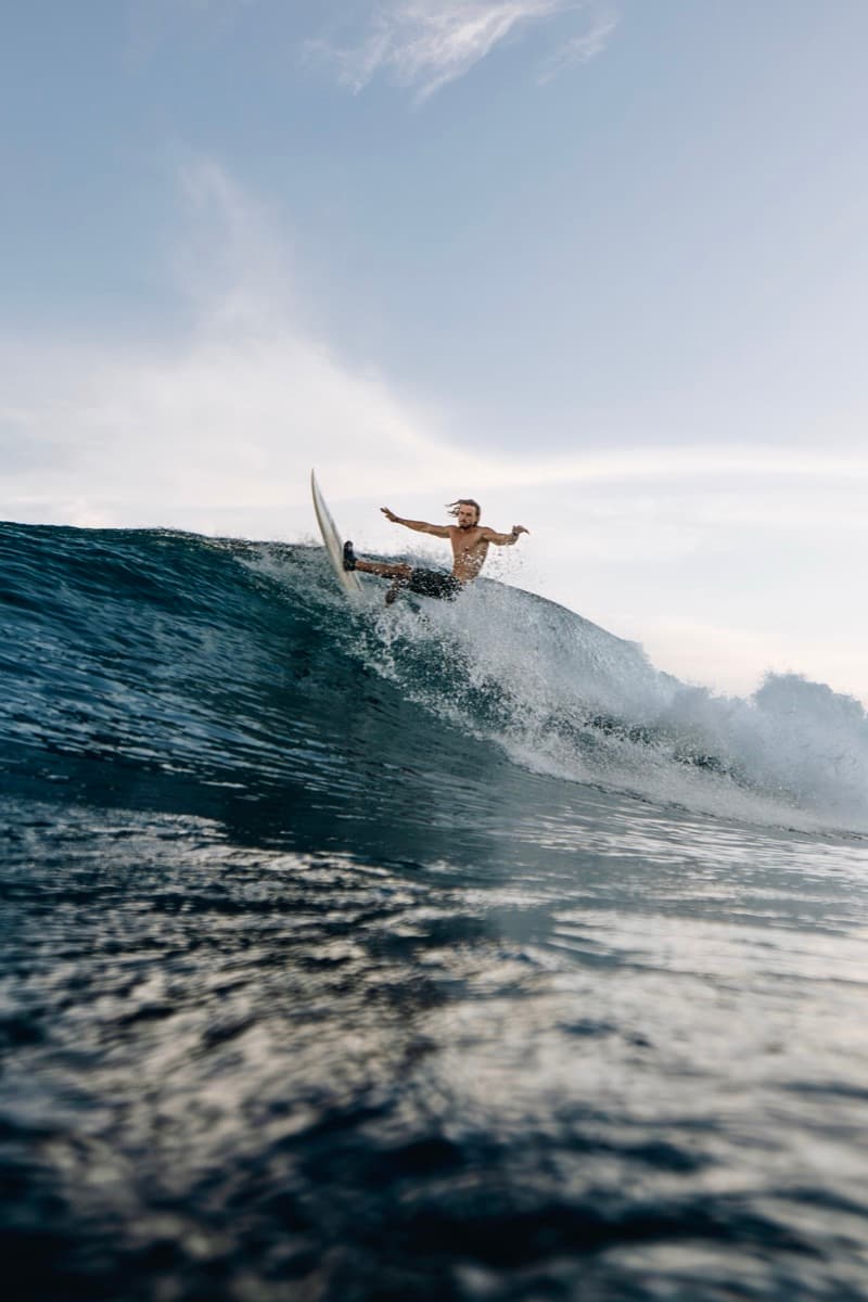 Nick surfing a wave